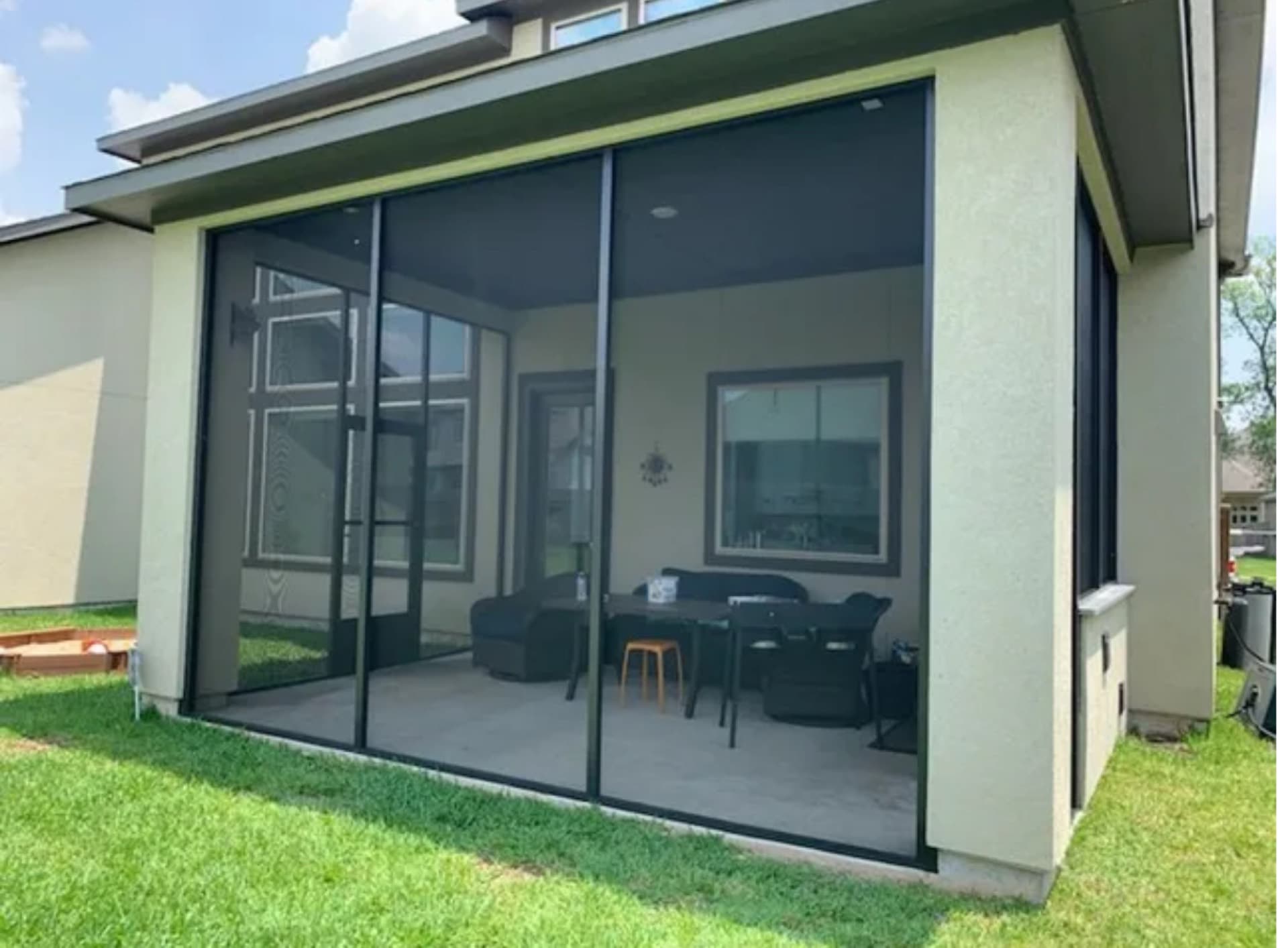 Screened front porch installed on a Brevard County home